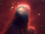 Ghostly star-forming pillar of gas and dust